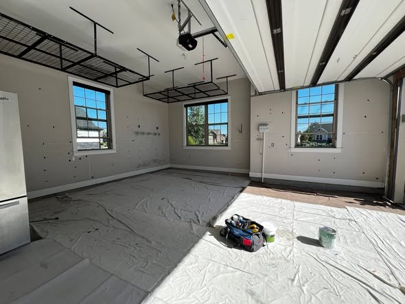 Freshly painted bedroom with large windows