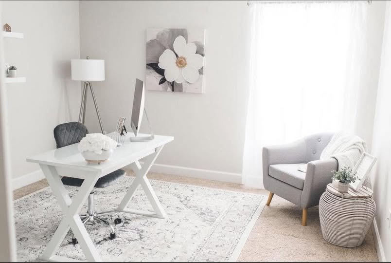 Bright dining nook with crisp, freshly painted walls and trim
