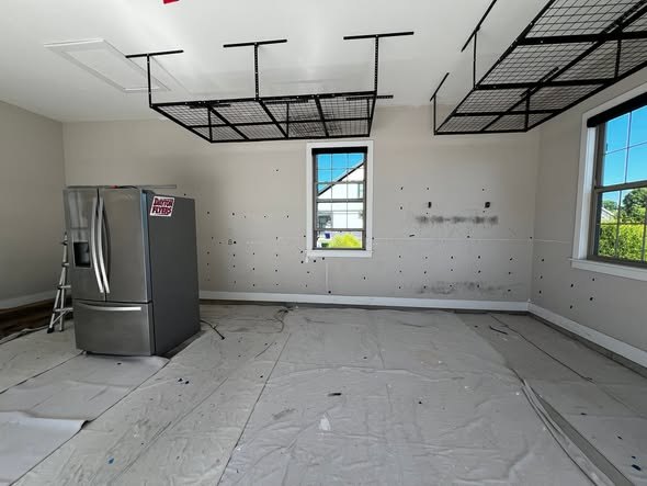 Painted room with large windows and clean trim